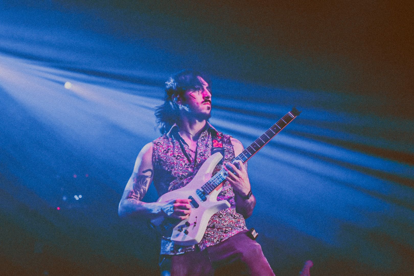 Guitarist under blue lights